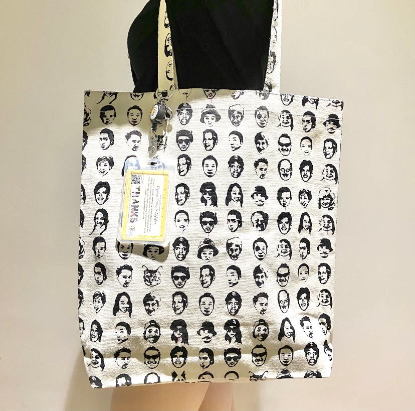 Faces Tote Bag with Retractable Card Holder and "I Can" Charm